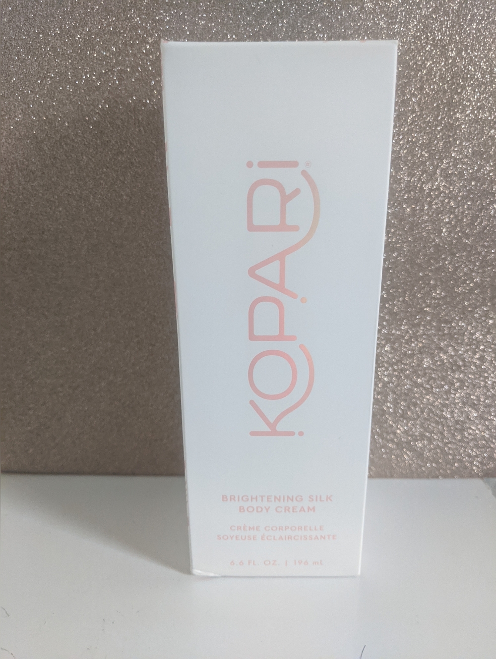Kopari Brightening Silk Body Cream - White with Blush Pink Logo